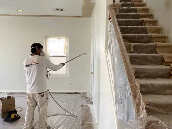 Interior walls and stairwell mid-repaint by ACP Painting in Phoenix, AZ