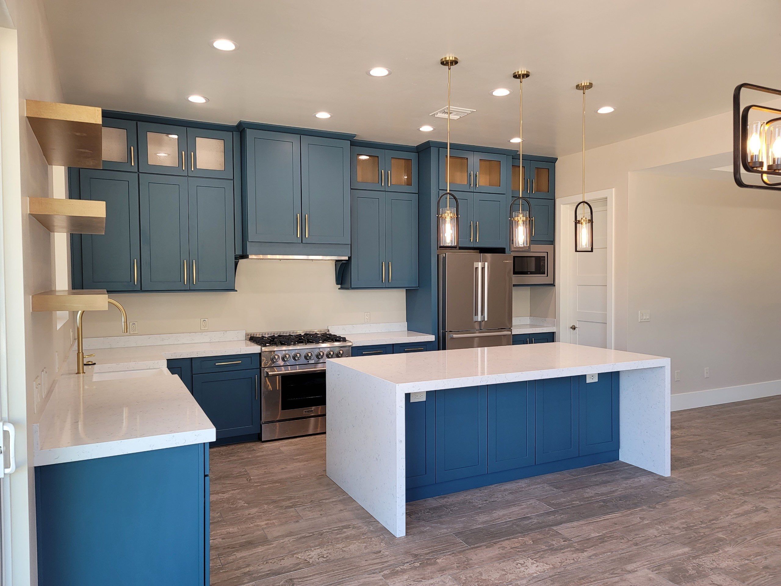 dust blue painted kitchen cabinets