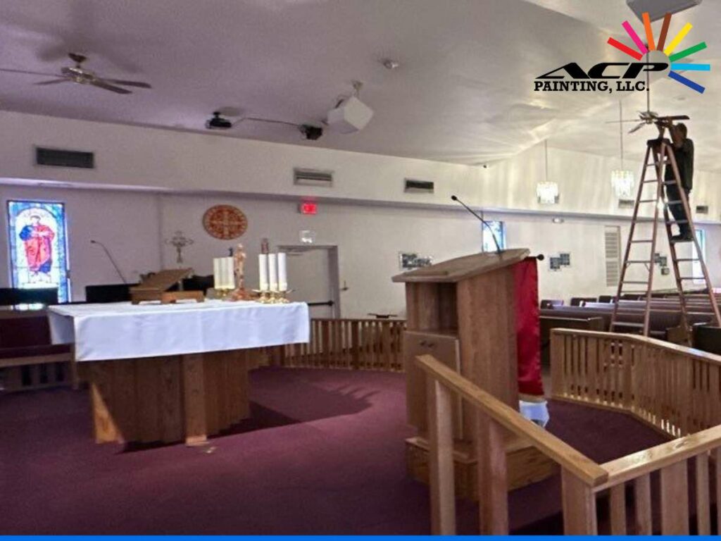ACP Painting team working on a Church Painting Project, focusing on high ceilings and detailed areas